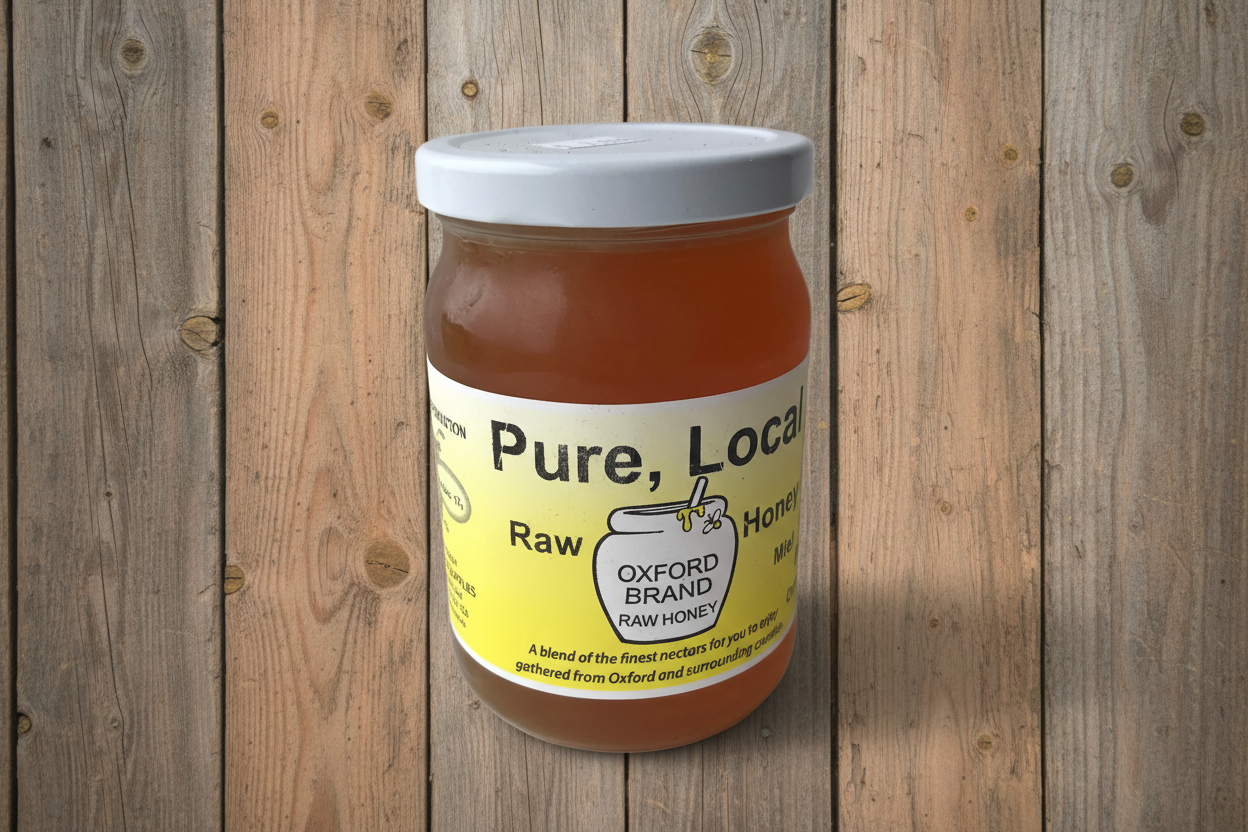 Jar of pure, local raw honey on a wooden background